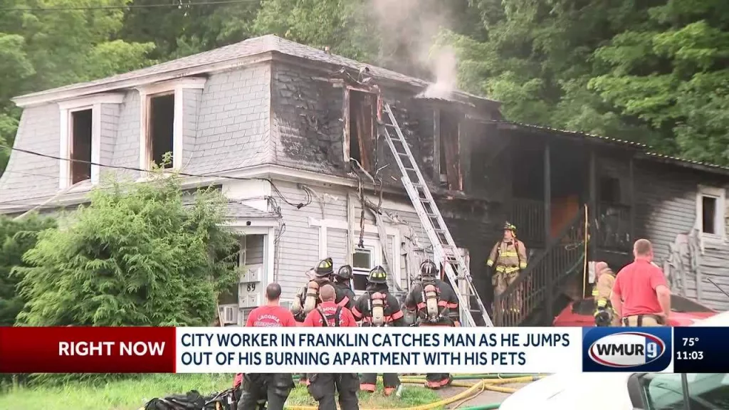 Worker catches man who jumped out of his burning apartment with his pets