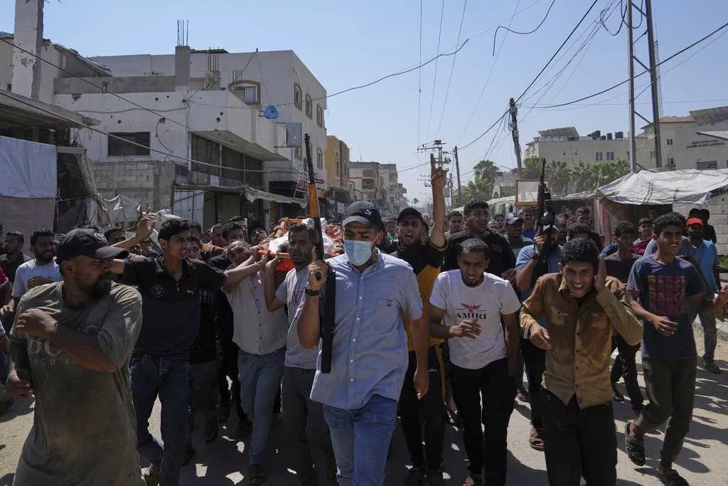 Amnesty International says Israel and aid system use starvation to commit Gaza genocide
