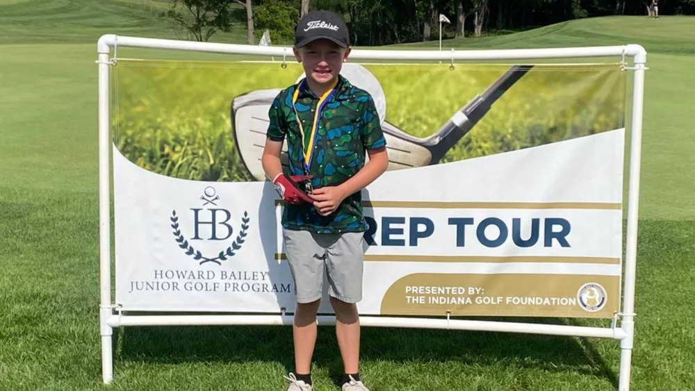 8-year-old boy wins national golf tournament