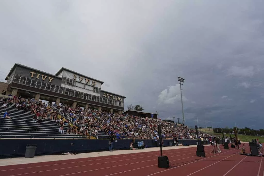 Hundreds gather at high school stadium to honor victims of Texas flash floods