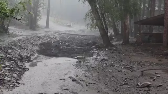 Watch as wall of water moves through as flash flood begins in Ruidoso, New Mexico
