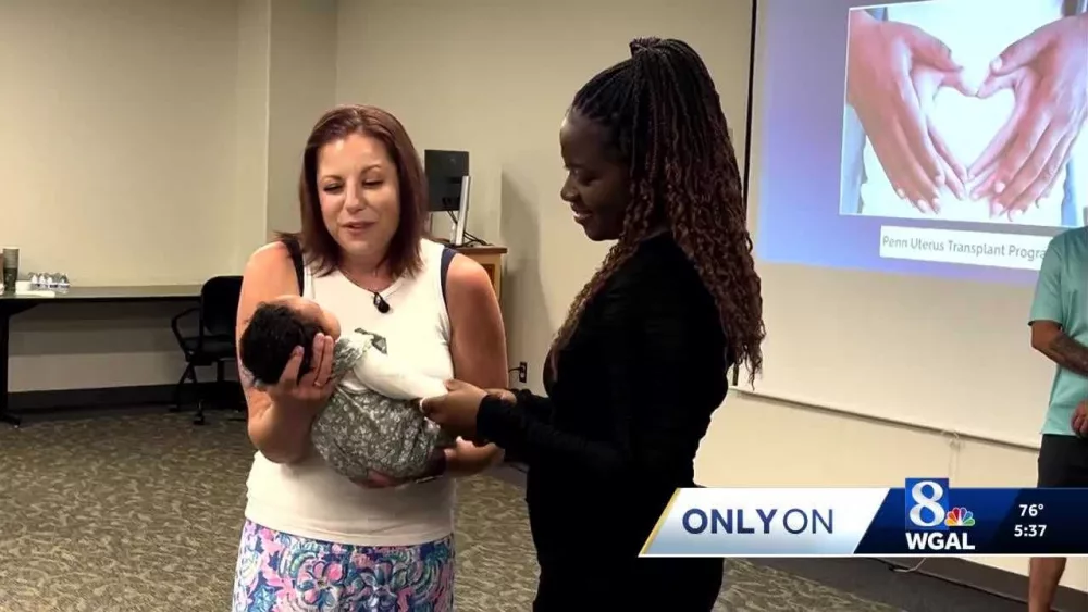 Two women connected by uterine transplant meet for first time