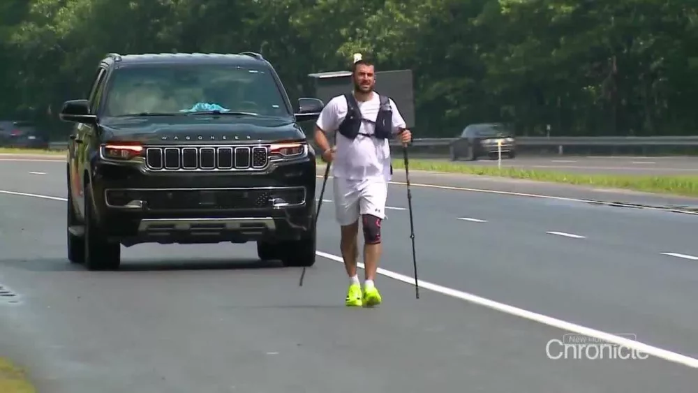 Man, previously bedridden for 2 years, completes record-setting run