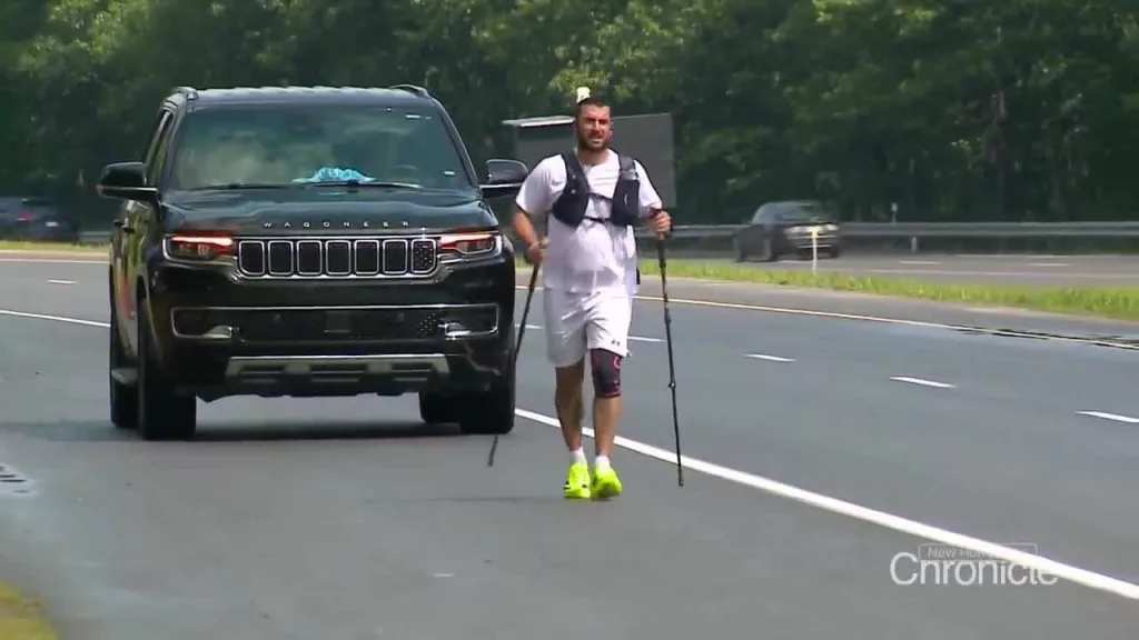 Man, previously bedridden for 2 years, completes record-setting run