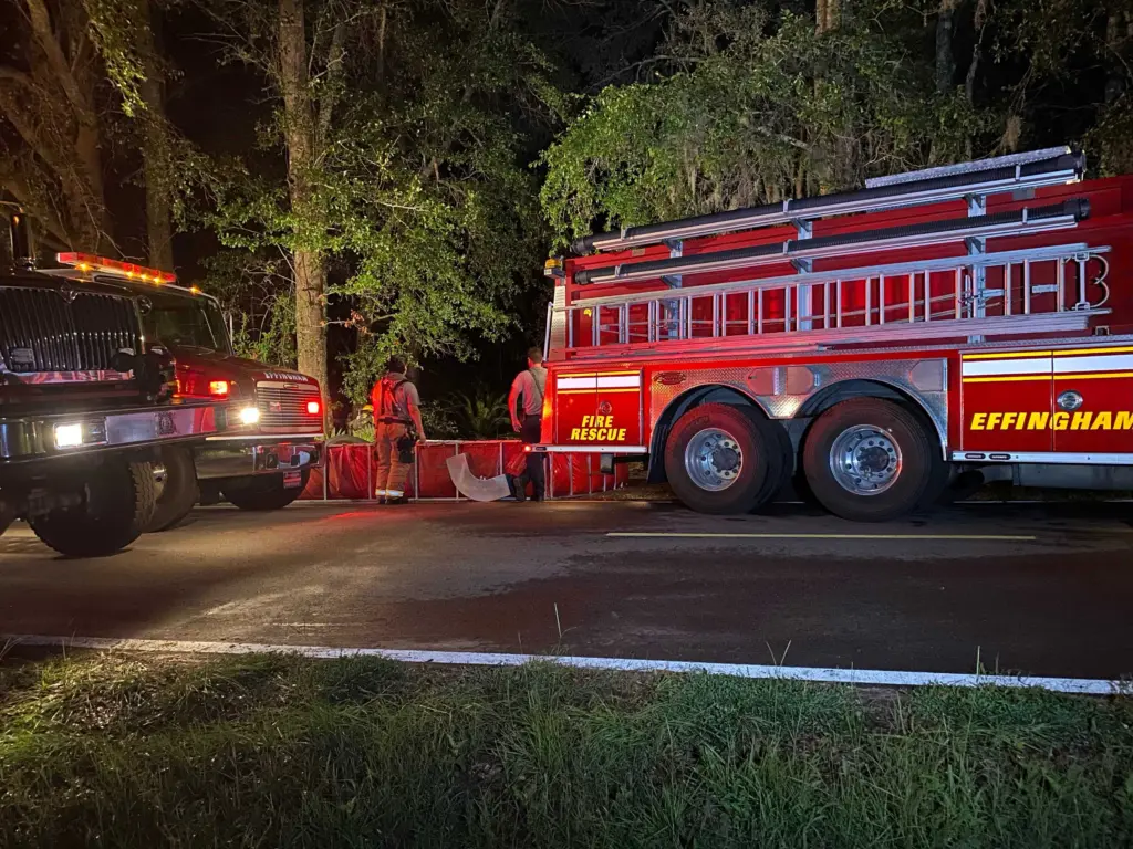 Effingham fire crews working to put out a house fire in Guyton