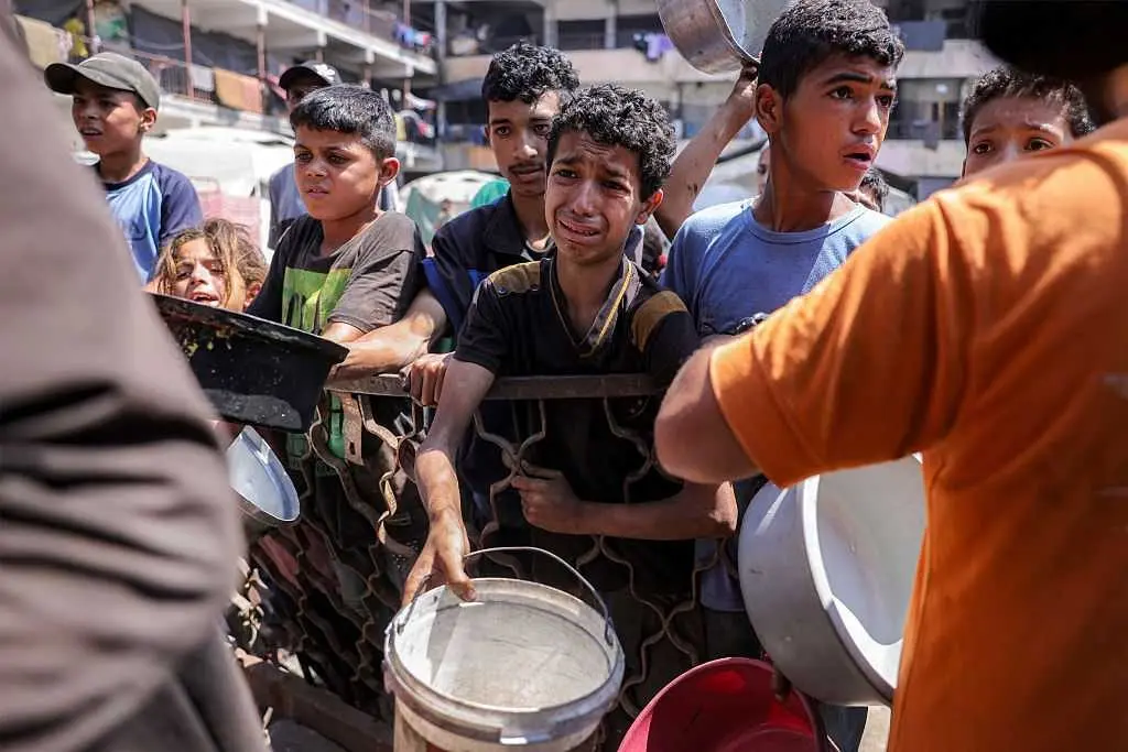 At least 32 Palestinians killed trying to reach US group's food distribution sites