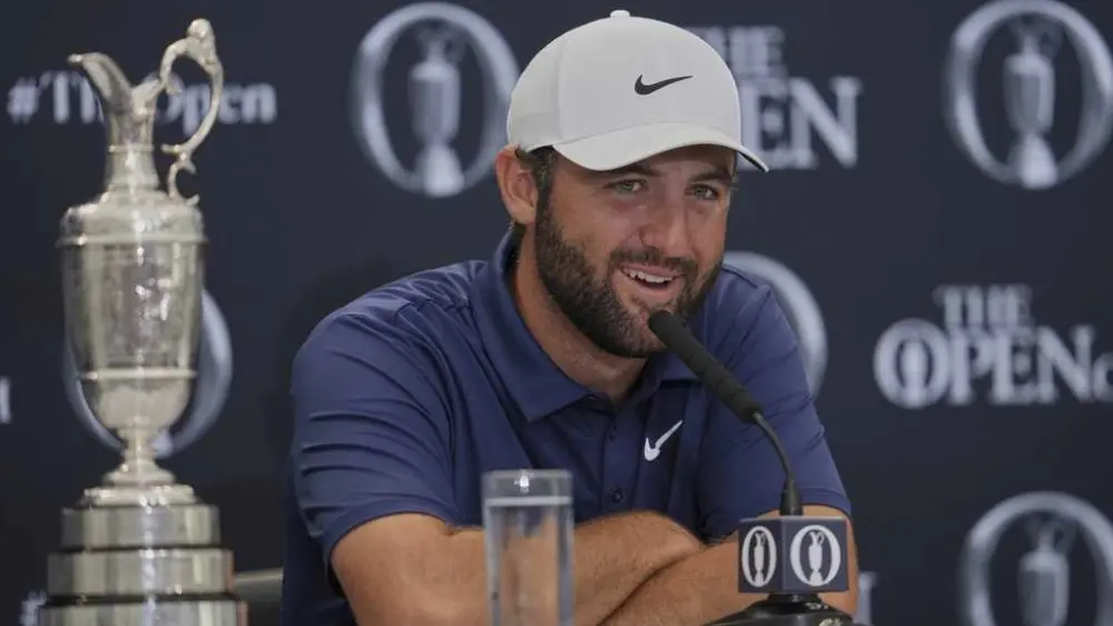 British Open champion Scottie Scheffler says comparisons to Tiger Woods 'a bit silly'