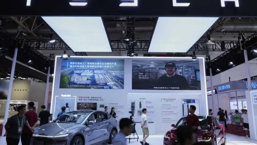Trump offers support to Musk's car company in a surprising post as Tesla stock plunges
