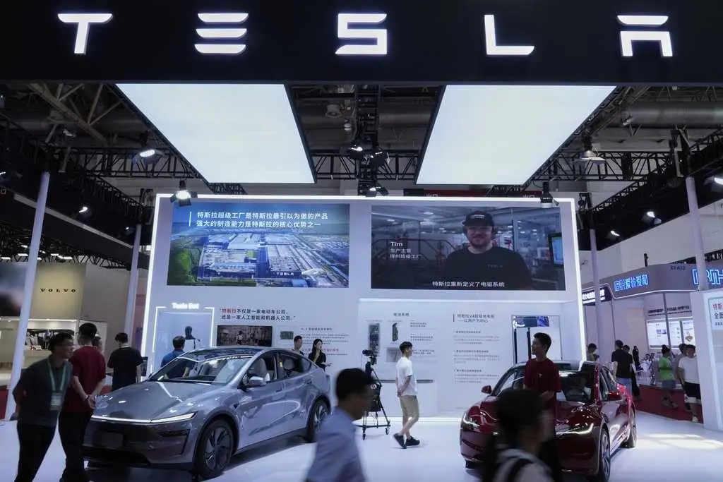 Trump offers support to Musk's car company in a surprising post as Tesla stock plunges