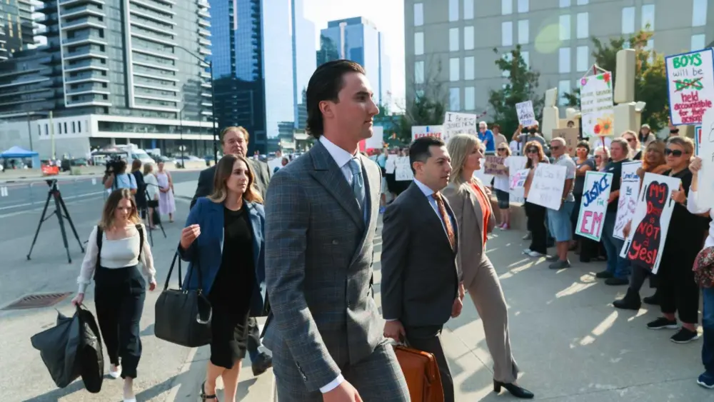 Judge acquits 5 former Canadian junior hockey players in sexual assault case that rattled the nation