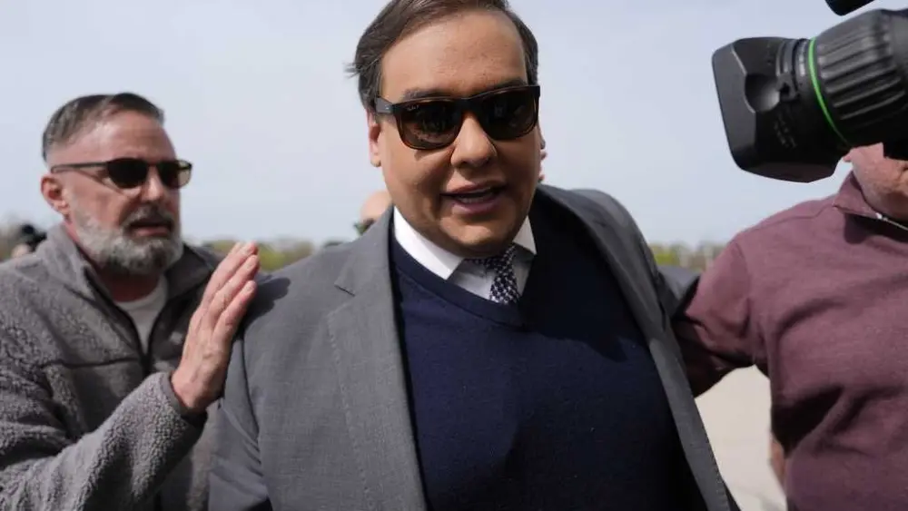 Former US Rep. George Santos to begin serving his 7-year fraud sentence