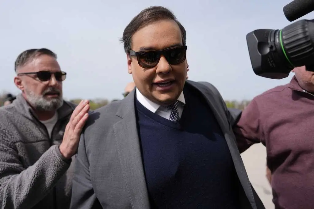 Former US Rep. George Santos to begin serving his 7-year fraud sentence