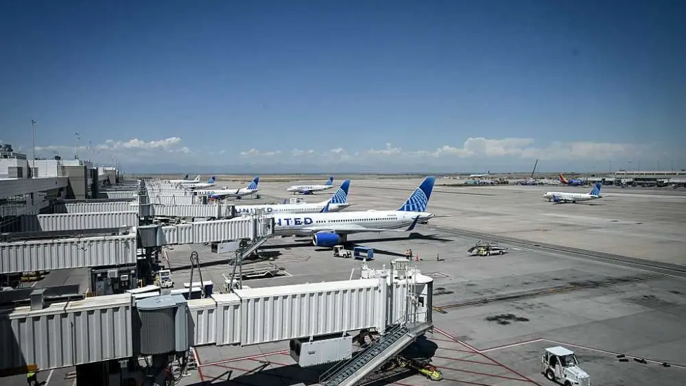 Plane evacuated in Denver after landing gear issue sparked fire, 1 injured