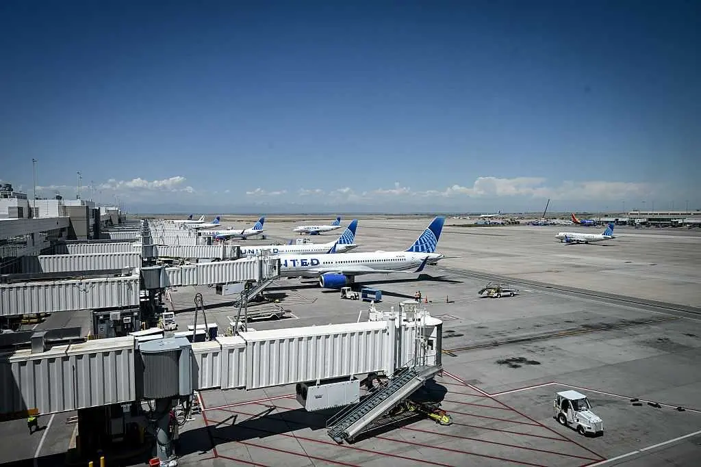 Plane evacuated in Denver after landing gear issue sparked fire, 1 injured