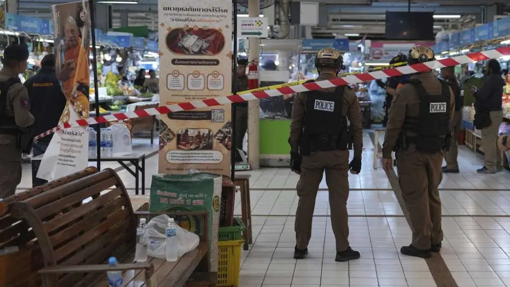 Gunman with a grudge kills 5 at Bangkok market, police say