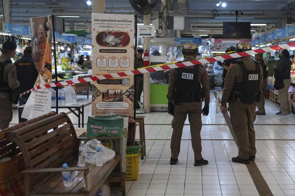 Gunman with a grudge kills 5 at Bangkok market, police say