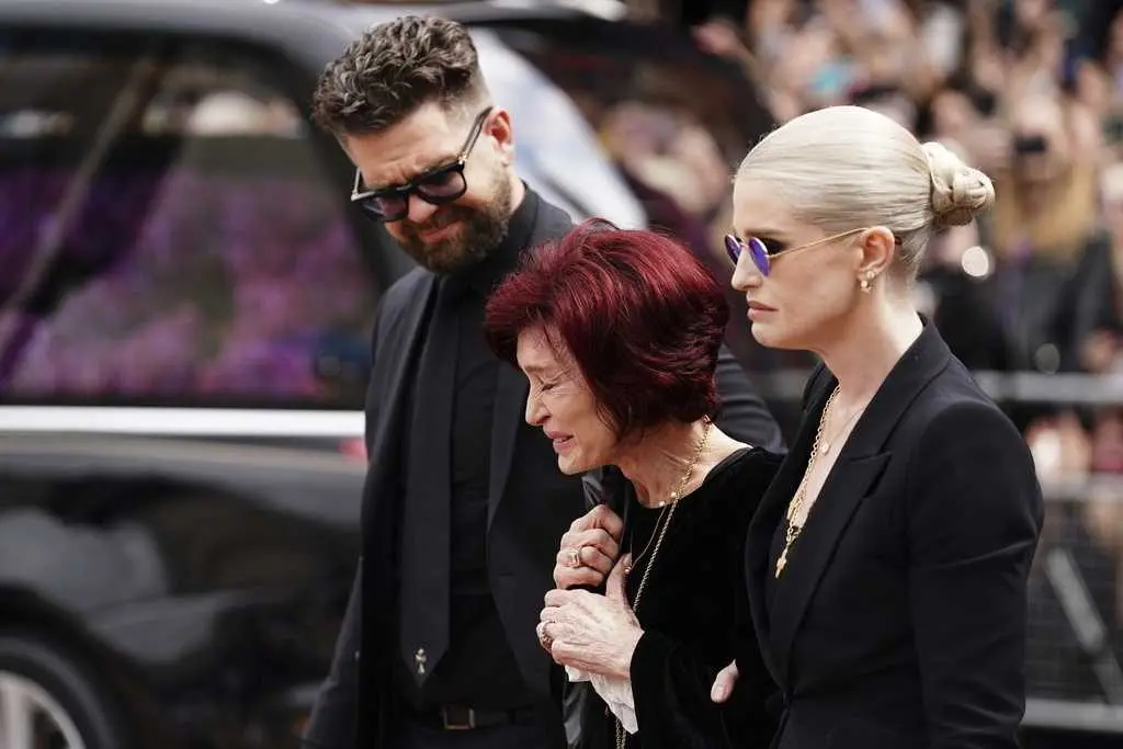 Birmingham, England, the home of metal, honors Ozzy Osbourne as hearse passes through