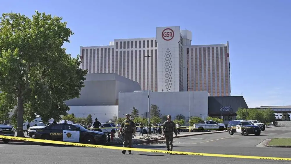 Gunman shot by officers after killing 3 people outside a Reno casino has died