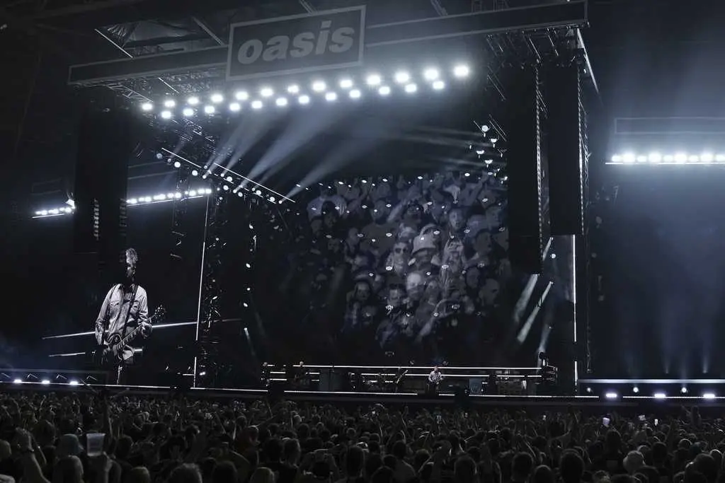 A man fell to his death during an Oasis concert at London's Wembley Stadium