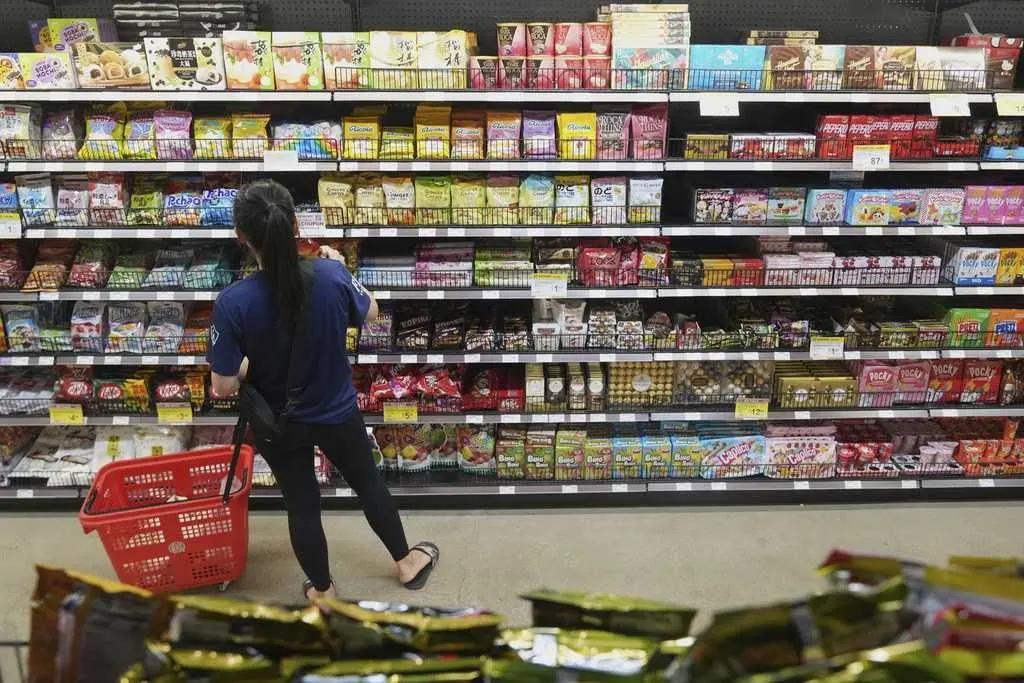 A majority of US adults are stressed about grocery costs, an AP-NORC poll finds