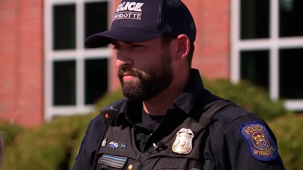 Officer becomes 'adopted grandson' after assisting older resident cut her grass after a long shift