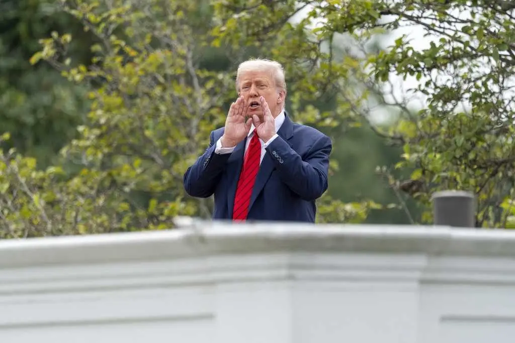 Trump takes an unexpected walk on the White House roof to survey new projects