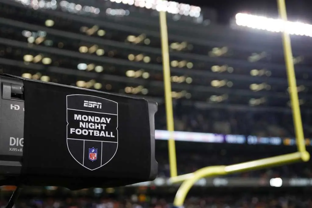 ESPN is acquiring NFL Network, rights for RedZone in a deal giving the NFL a stake in the network