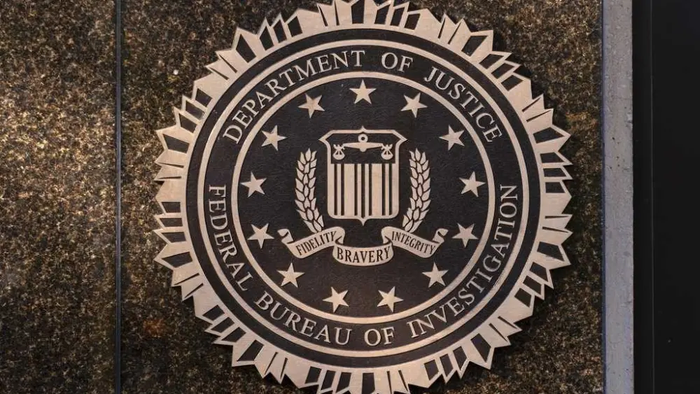 Senior FBI official who resisted Trump administration demands is pushed out, AP sources say