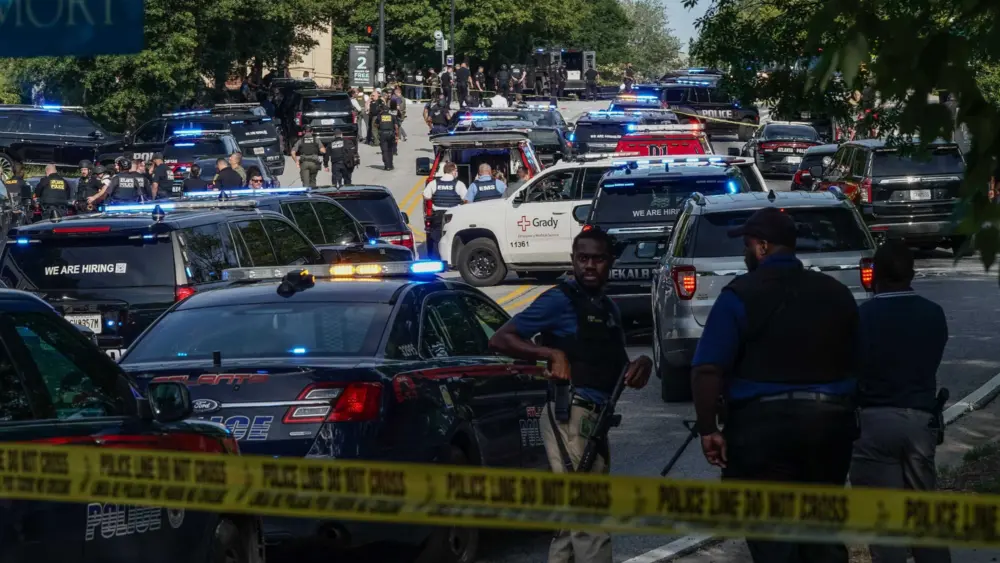 CDC leaders call shooting targeted as rattled staff say they felt like 'sitting ducks'