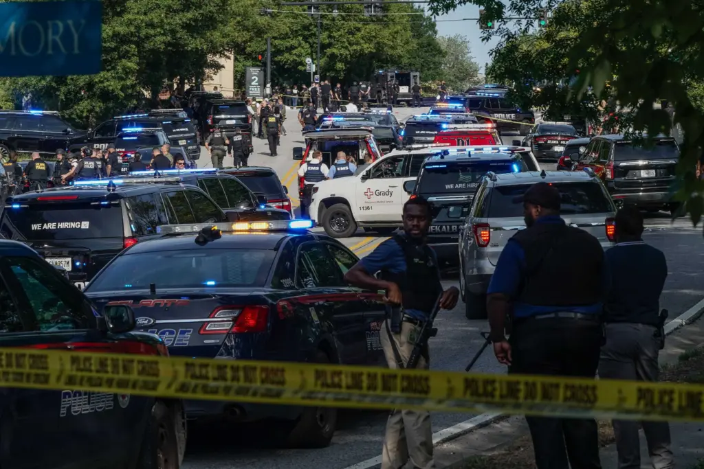 CDC leaders call shooting targeted as rattled staff say they felt like 'sitting ducks'