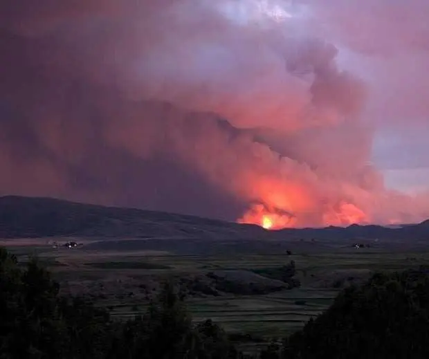 Colorado prison evacuated as growing wildfire becomes one of the largest in state history