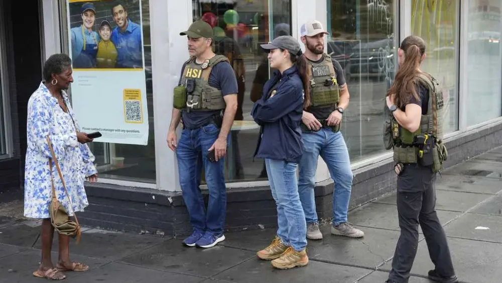DC residents protest as White House says federal agents will be on patrol 24/7