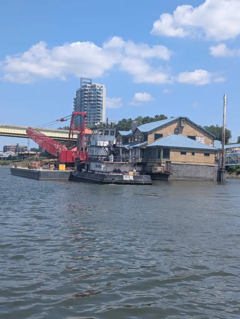 WATCH: A permanently closed Hooters restaurant was spotted being towed down Ohio River in Kentucky
