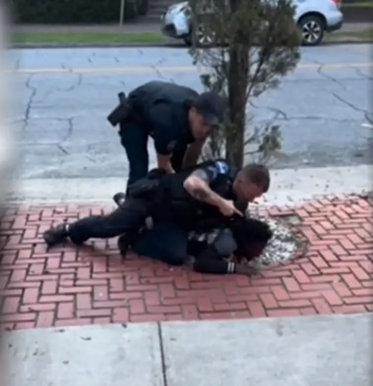 During arrest gun allegedly fell from suspects waist