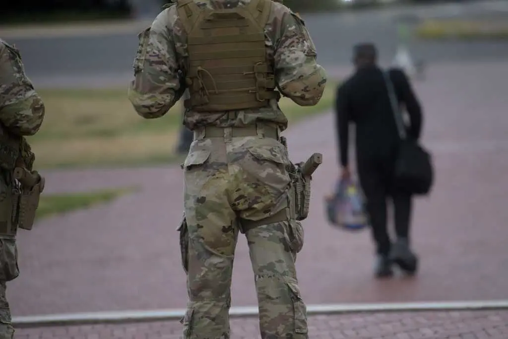 Some Guard units in Washington are now carrying firearms, Pentagon says