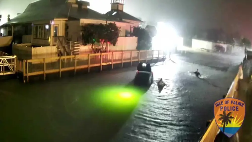 Video shows Good Samaritans resucing South Carolina driver after car sinks in creek during rain