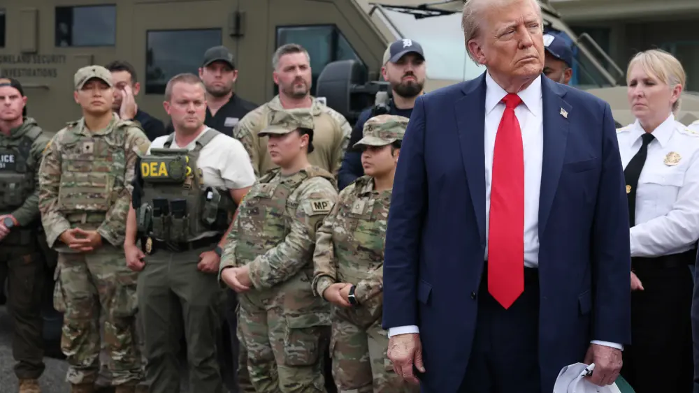 What federal laws could President Trump use to send troops to US cities?