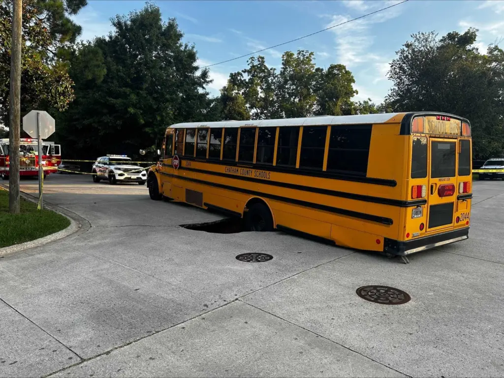 Savannah Police redirect traffic after school bus gets stuck in sinkhole