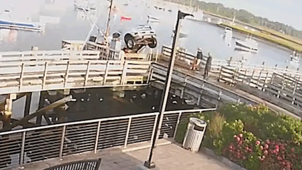 Caught on camera: Pickup truck accidentally driven off pier