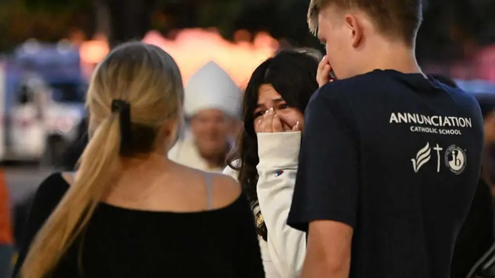 Hundreds honor victims of deadly Minneapolis Catholic school shooting