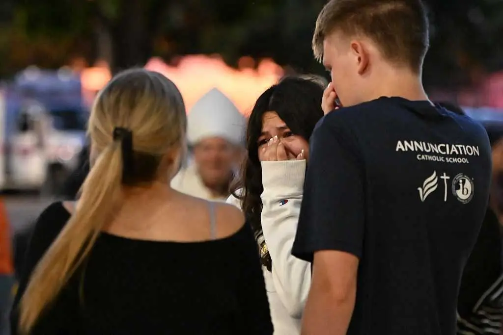 Hundreds honor victims of deadly Minneapolis Catholic school shooting
