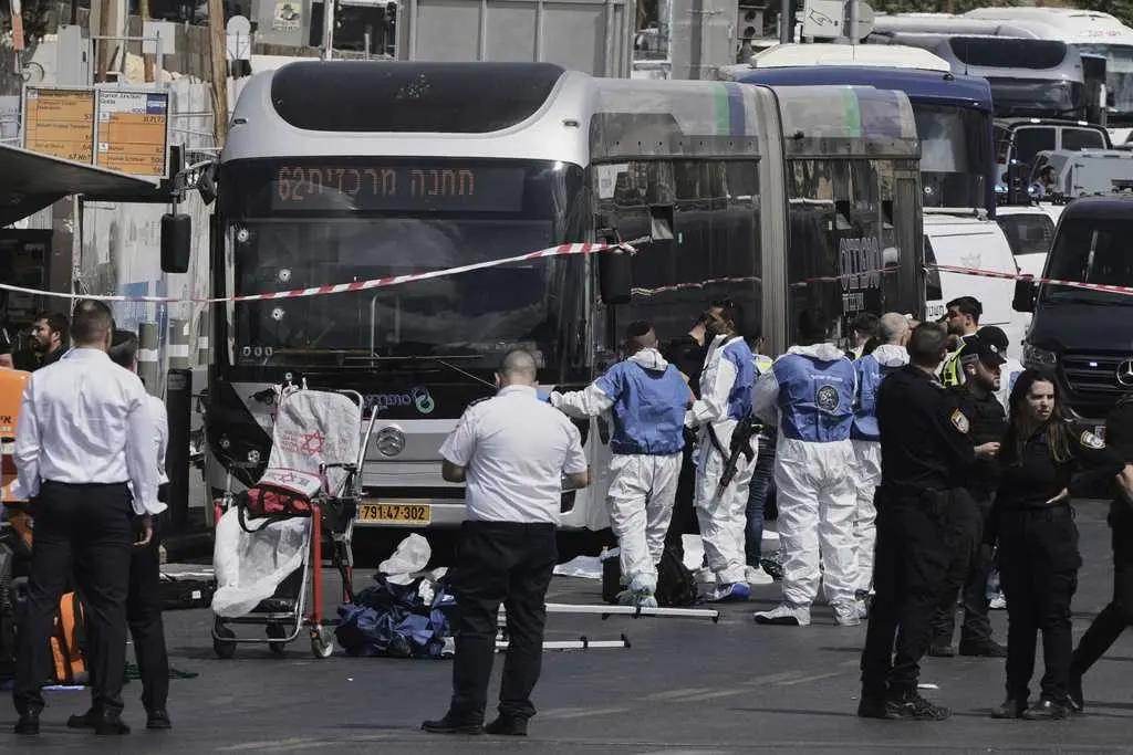 Five dead after attackers open fire at Jerusalem bus stop