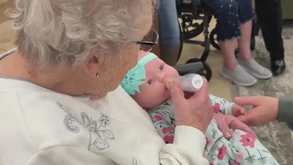 Dementia baby dolls bring meaning, joy into memory care patients' lives: It "fills your cup"