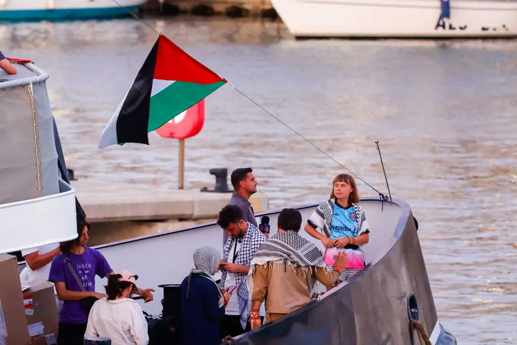 Activists, Greta Thunberg say a drone hit their Gaza aid boat in Tunisia; authorities deny attack
