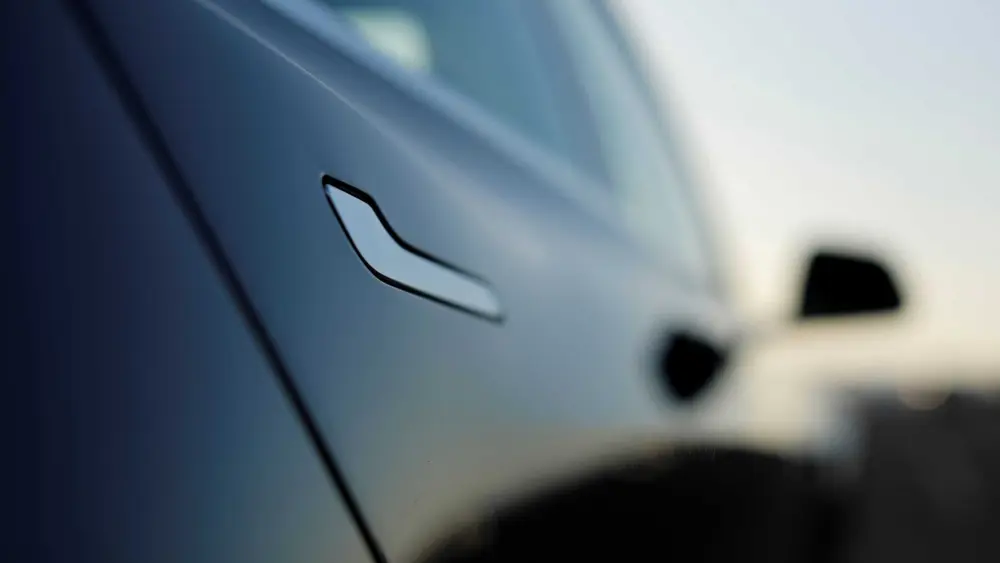 Tesla is looking to redesign its door handles following trapped-passenger reports