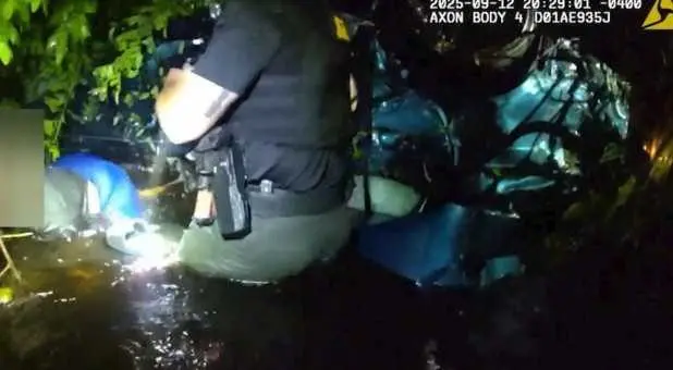 911 call shows fear, concern from couple trapped in car sinking in Florida canal