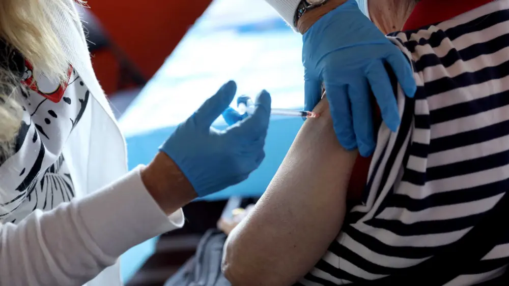 How to get a COVID-19 shot and ensure it's covered by your insurance