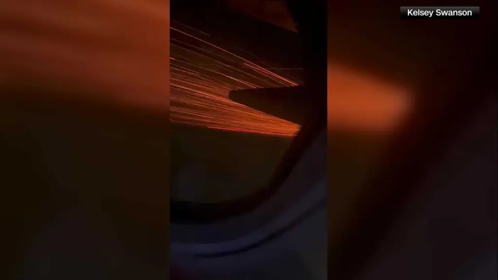 Plane leaving Georgia makes emergency landing after sparks fly out of engine