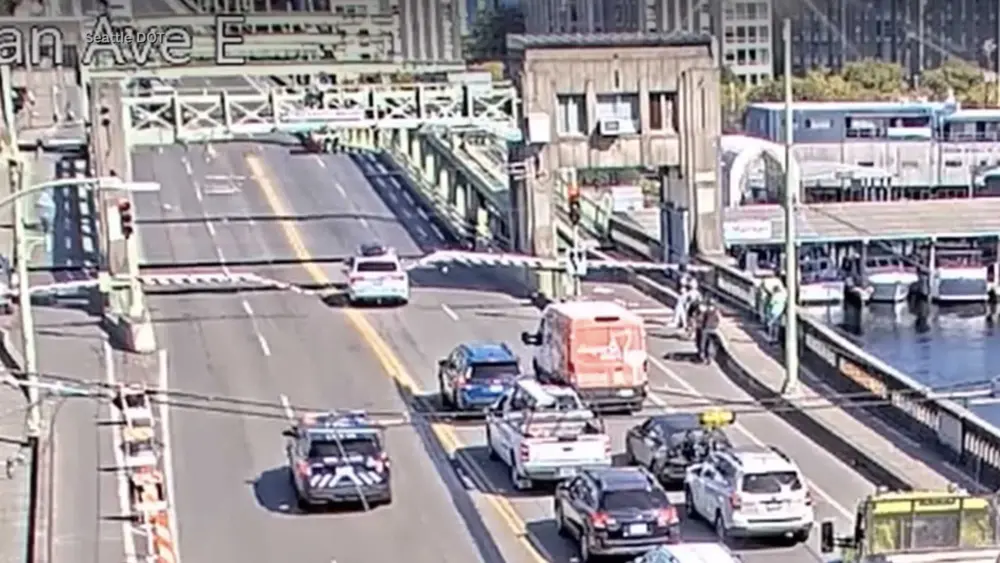 Suspect's car jumps gap of open drawbridge during high-speed police chase