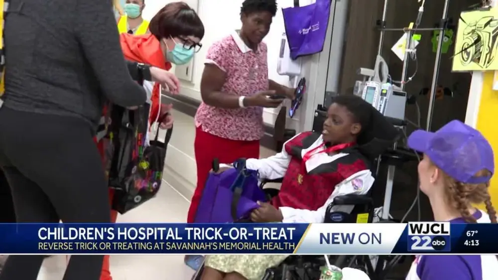 Reverse trick-or-treat parade lights up Memorial Health Children's Hospital